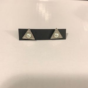 Triangle shaped little stones around a centre pearl beautiful earrings